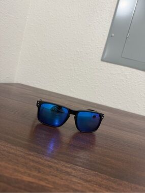 Black Frame Oakley Sunglasses with Polarized Blue Mirrored Lenses